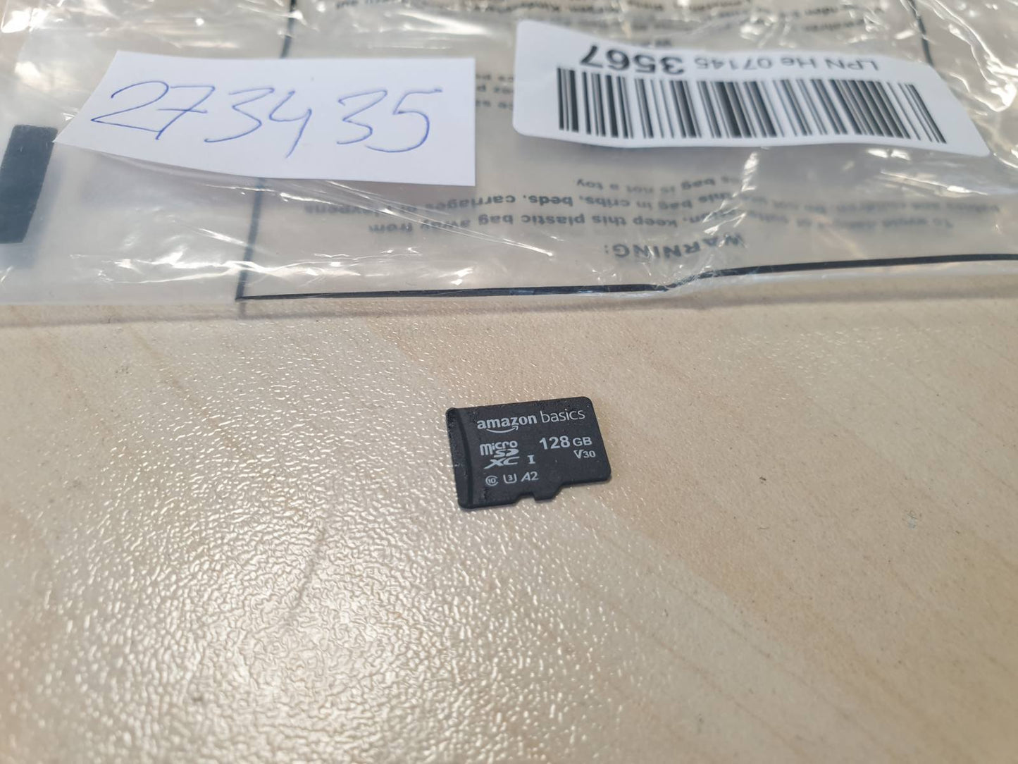 273435 - AMAZON BASICS Kartë memorieje 128GB microSDXC me adaptor SD, A2, U3, Shpejtësi leximi deri në 100MB/s, e zezë