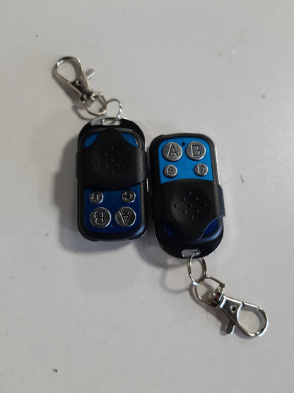 274259 - 2 Telekomanda Universale për Porta Automatike, Frekuencë 433.92 MHz, Kod Fiks (8.5 x 6 x 1cm)