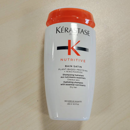 275484 - KÉRASTASE Shampo Nutritive Satin për Flokë të Thatë, 250 ml, me Niacinamidë dhe Proteina Bimore, +44% Hidratim i Menjëhershëm*, +45% Butësi*