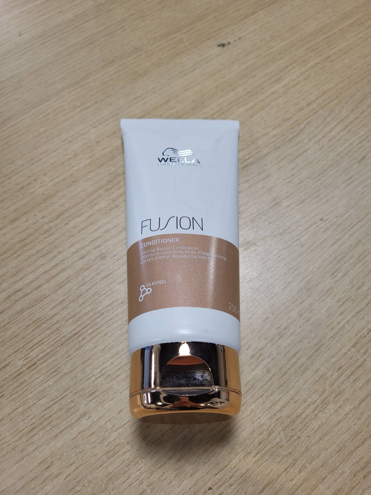 290107 - WELLA PROFESSIONALS Balsam Fusion Intense Repair, 200ml - Zbërthim dhe zbutje për flokë të dëmtuar