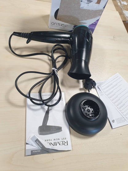 293864 - THARËSE FLOKËSH REMINGTON - E vogël, e palosshme dhe e fuqishme, 2000W, Përshtatje tensioni 120/220-240V, Grykë stilimi dhe difuzor, 2 cilësime ngrohjeje dhe ventilatori, D1500