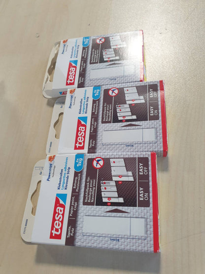 294403 - tesa Shirita ngjitës Powerstrips për letër-muri dhe suva – Mbushje për thonjtë ngjitës tesa – 1.0 kg Ngjitje – Hiqet pa mbetje – Pako me 3 copë