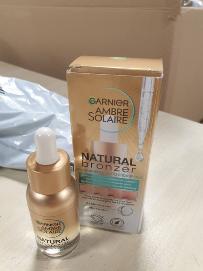 297421 - Garnier Ambre Solaire Natyral Bronzer Vetë Rrezitës Serum, 30 ml