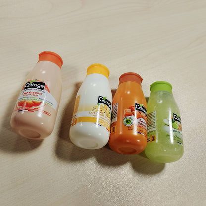 297648 - COTTAGE Kit Udhëtimi, 4 x 50 ml, xhel dushi eksfoliues, xhel dushi me qumësht, losion hidratues, shampo i delikat, 97% përbërës natyral