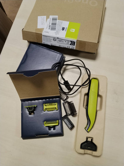 297956 - PHILIPS Makinë autentike për shkurtimin elektrik të mjekrës dhe fytyrës OneBlade 360, 3 tehe 360, 4 krehër për qime (1, 2, 3, 5 mm), QP2834/31.