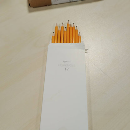 300040 - AMAZON BASICS Lapsa Graphite HB me bosht druri, të mprehur paraprakisht, majë gome që nuk njollos, pako me 12 lapsa