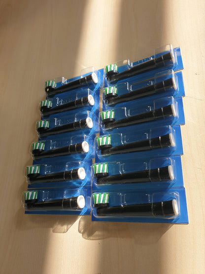 300587 - ORAL-B Koka Furçash Zëvendësuese PRO CrossAction, të Zeza, Pako me 12 Furça