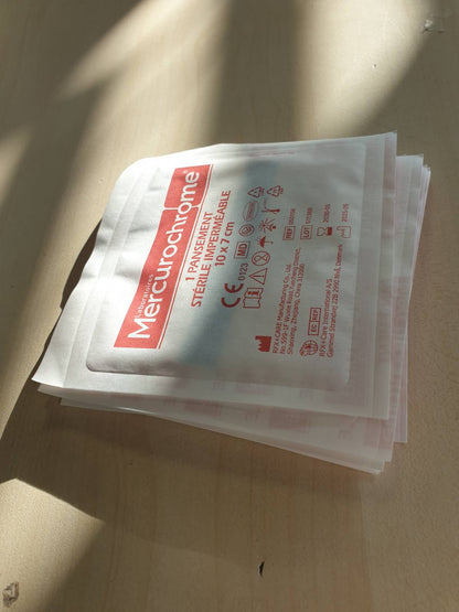 301272 - MERCUROCHROME - Fasha sterile transparente të papërshkueshme nga uji - Kuti me 10 fasha - Ngjitës i integruar me mbështetje jo-ngjitëse - 10 cm x 7 cm
