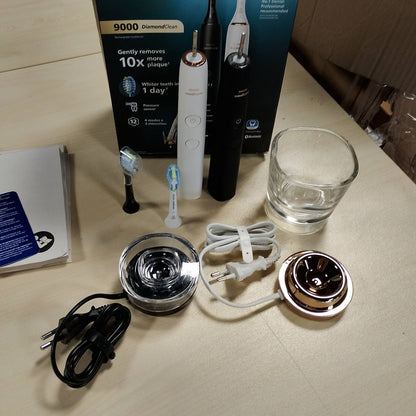 301542 - PHILIPS Furçë dhëmbësh elektrike Sonicare DiamondClean 9000, HX9914/57, 4 mënyra pastrimi, 3 nivele intensiteti, xham karikimi, ari i zi dhe rozë, pako me dy pjesë
