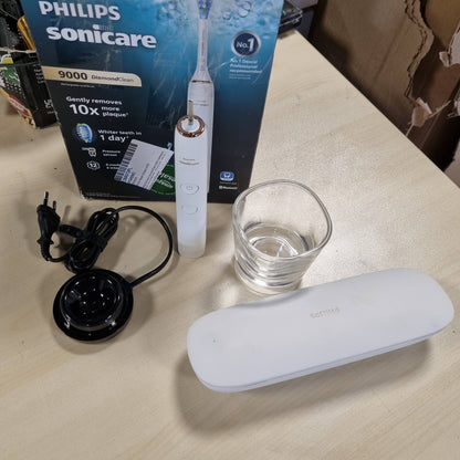 301561 - PHILIPS Furçë dhëmbësh elektrike Sonicare DiamondClean 9000, HX9911/94, sensor presioni, 4 mënyra pastrimi, 3 nivele intensiteti, xham karikimi, kuti udhëtimi USB, ngjyrë ari rozë