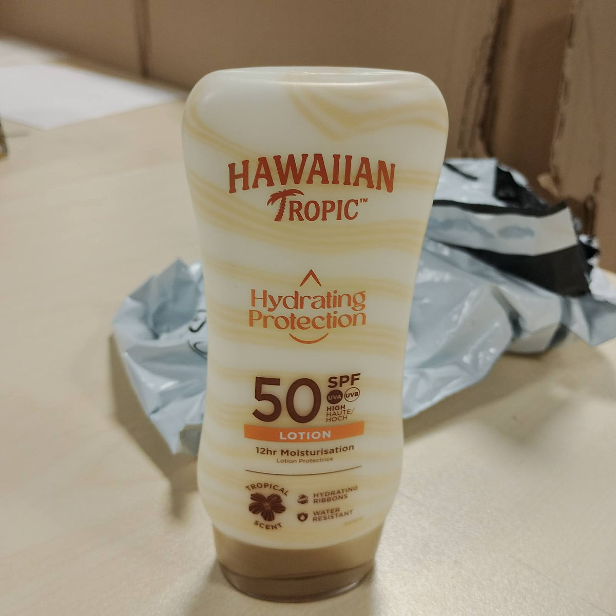 302468 - HAWAIIAN TROPIC Losion hidratues mbrojtës, SPF 50, 180ml