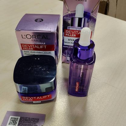 303092 - L'OREAL PARIS Set Rutine Anti-Plakje dhe Anti-Rrudha me 2 Produkte, Serum Plotësues + Krem Dite Volumizues, I Pasuruar me Acid Hialuronik, Për të Gjitha Llojet e Lëkurës
