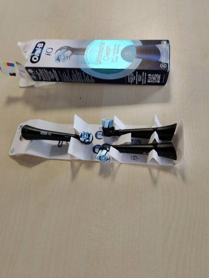 311672 - ORAL-B Koka Zëvendësuese iO Series Ultimate Clean të Zeza, 3 Koka të Rrumbullakëta Origjinale për Furçë Dhëmbësh Elektrike, Qime të Kryqëzuara, Heqje Pllake
