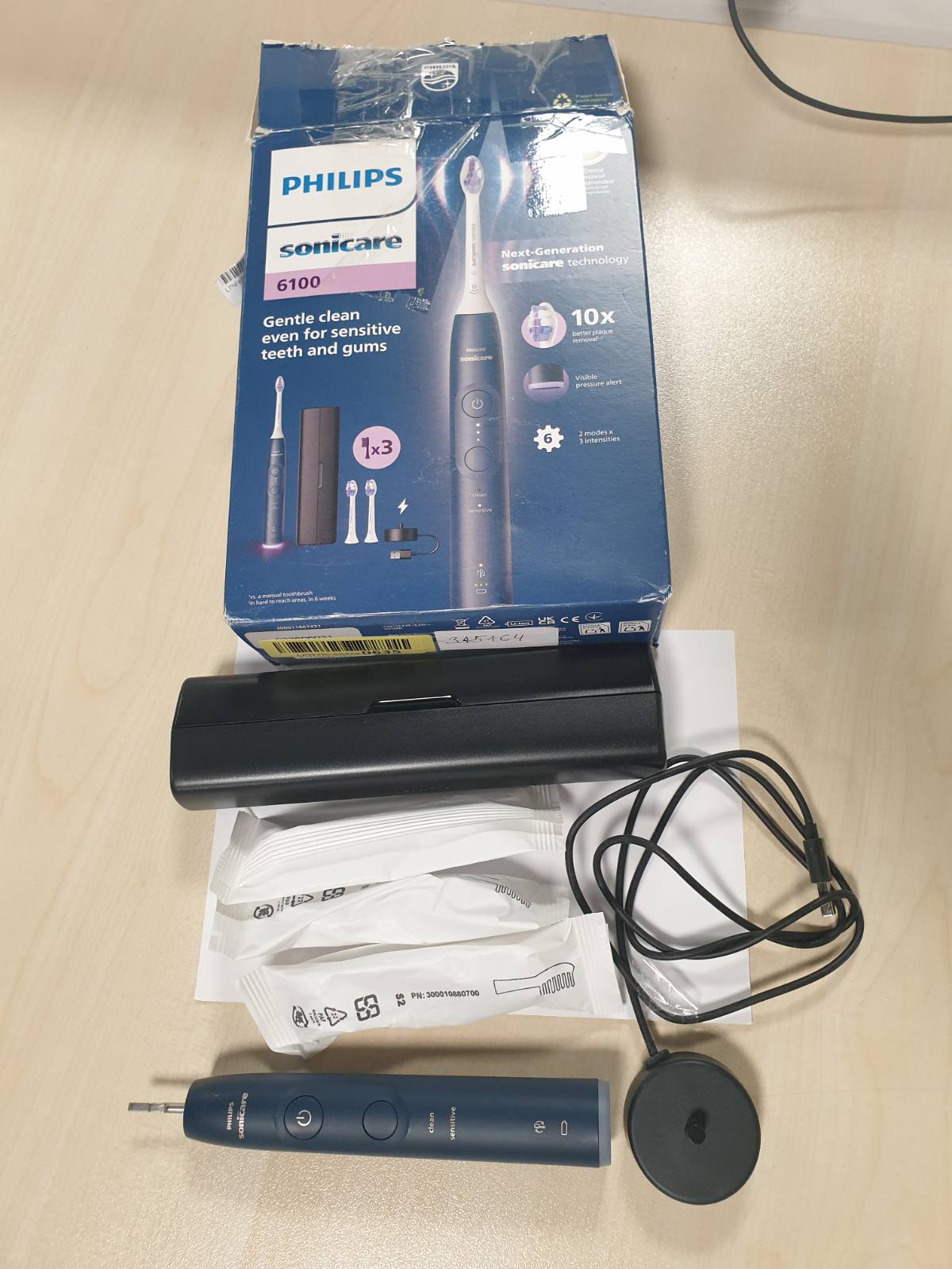 315164 - Furçë dhëmbësh elektrike Sonicare 6100, HX7403/01, 2 mënyra pastrimi, 3 nivele intensiteti, kontroll presioni, EasyStart, SmartTimer, çantë udhëtimi, blu marine