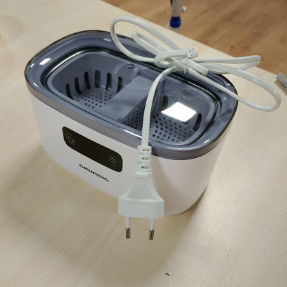 315900 - GRUNDIG Pastrues ultrasonik UC 6620, rezervuar uji 500 ml, fuqi 50 W, mbajtëse ore e integruar, e bardhë
