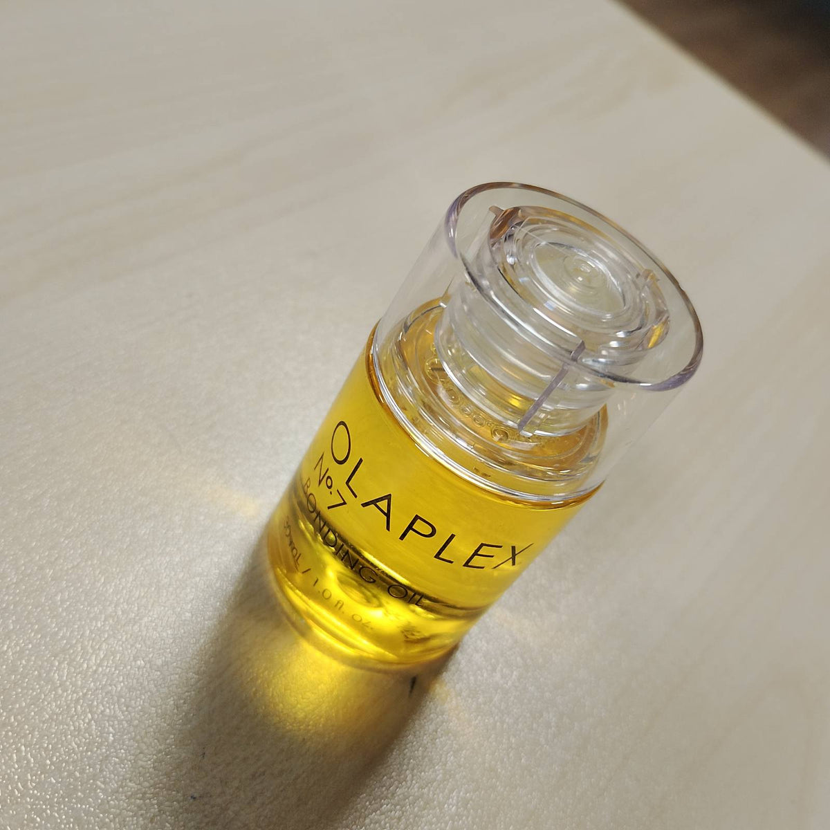 316483 - OLAPLEX Vaj për flokë Nr. 7, 30 ml, Vaj i koncentruar me shkëlqim të lartë, Mbrojtje nga nxehtësia, Zbut flokët, Kontroll i kaçurrela deri në 72 orë