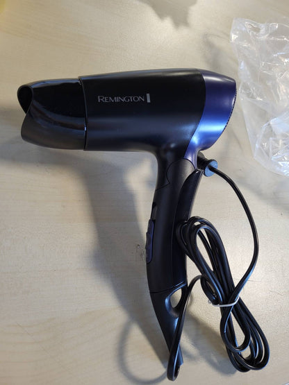 317516 - REMINGTON Tharëse flokësh udhëtimi D2400, 1400 W, Përshtatëse e tensionit botëror 120/220-240V, Grykë stilimi, 2 cilësime ngrohjeje dhe ventilatori, Jashtëzakonisht e vogël dhe e palosshme