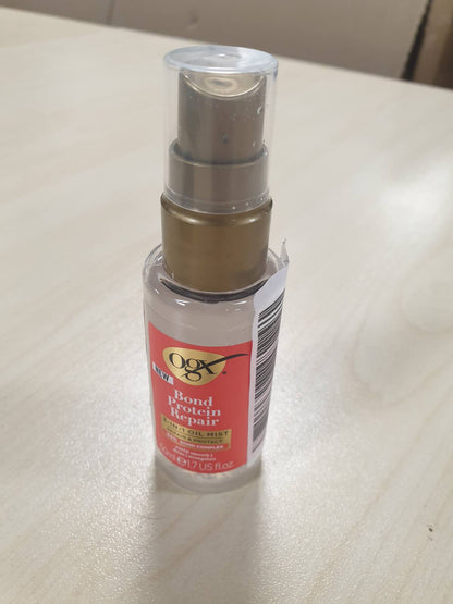 318539 - OGX Sprej 3-në-1 Repair and Protect Bond Protein, 50ml, Teknologjia Lipi Pro Shield dhe Teknologjia e Riparimit të Dyfishtë