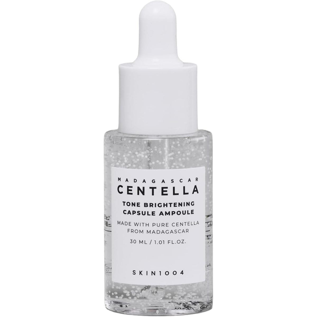 301301 - SKIN1004 Ampulë ndriçuese toni Madagascar Centella – Serum korean me niacinamide për korrigjim të butë dhe efektiv të njollave të errëta, 30 ml