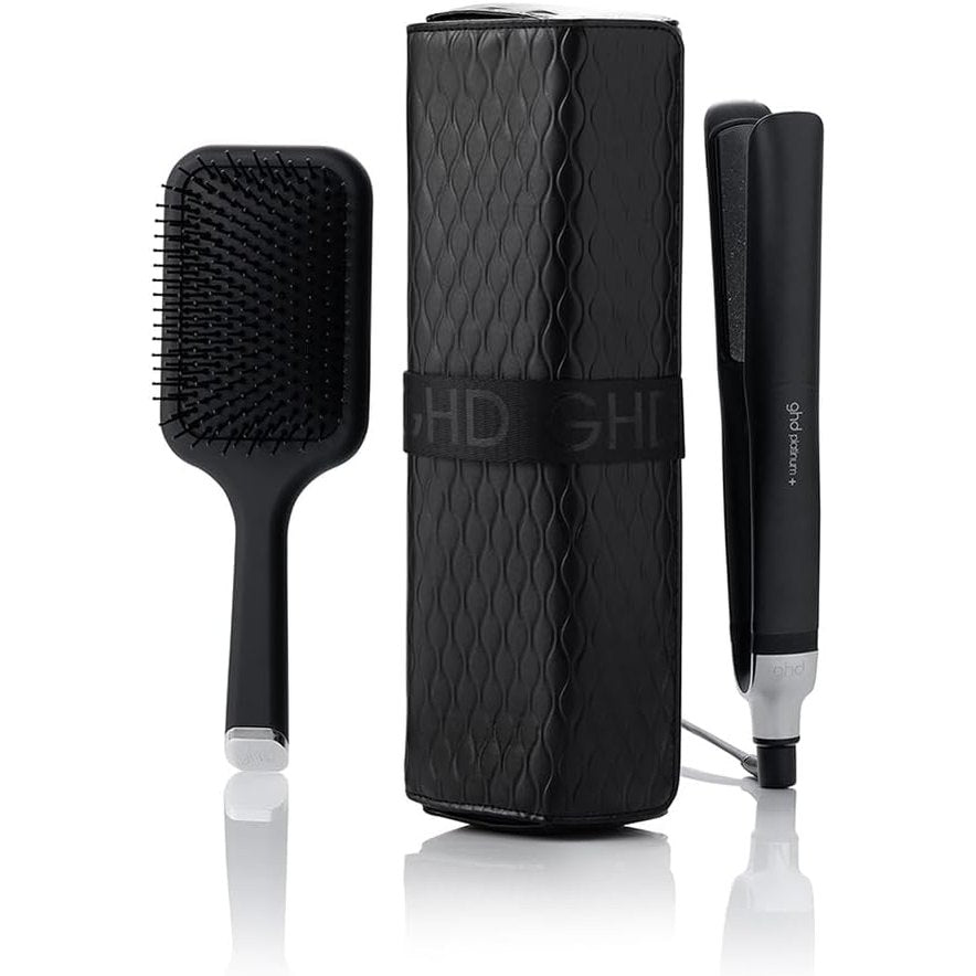 320850 - ghd Set Dhurate Platinum+, përfshin pjastër flokësh profesionale, furçë dhe kuti rezistente ndaj nxehtësisë.