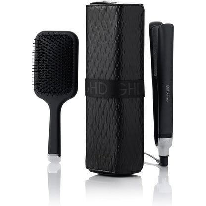 320850 - ghd Set Dhurate Platinum+, përfshin pjastër flokësh profesionale, furçë dhe kuti rezistente ndaj nxehtësisë.