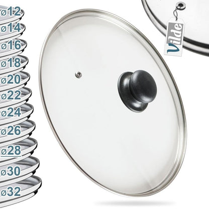 254325 - VILDE Kapak qelqi universal 28 cm - Rezistent ndaj nxehtësisë deri në 200°C - Rrip çeliku inox në ngjyrë argjendi dhe dorezë plastike - Për tenxhere, tiganë dhe tava - Me kanal avulli - Sistem transparent shikimi