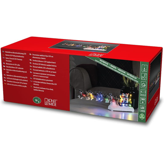 209830 - KONSTSMIDE Skenë LED 'Burrë dëbore me sajë qensh', Kohëmatës 6 orësh, 10 LED, Ngjyra shumë, Funksionon me bateri, Përdorim brenda ambientit, modeli 4242-000