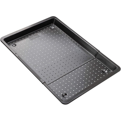 214130 - Pllakë e shpuar Zenker e zgjerueshme nga 37 në 52 cm, me sistem mbylljeje automatike, skaj XXL 3 cm. Nga çelik karboni i veshur me teflon jo-ngjitës. Linja metalike klasike e zezë.