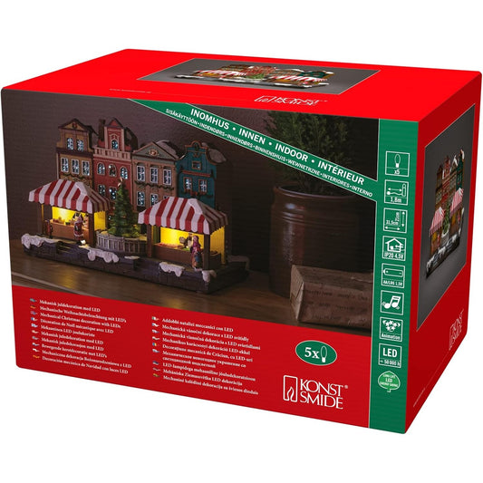 177061 - KONSTSMIDE Shtëpi me Fibra Optike LED me Pamje Qyteti dhe Pemë Krishtlindjesh, Muzikë, 5 LED me Ngjyra, Transformator/Bateri 4.5V, 0.32W, Kabllo e Zezë, Bateri: 3 x AA 1.5V (jo të përfshira) - 4231-000