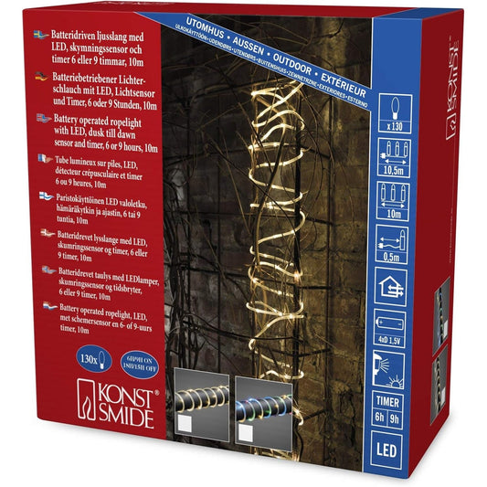 196336 - KONSTSMIDE Mini Tuba LED, 5m, me Sensor Drite dhe Kohëmatës 6/9 Orësh, 65 Diode të Bardha të Ngrohta, Operon me Bateri 2 x D 1.5V (Nuk Përfshihen), për Përdorim të Jashtëm (IP44), Kabllë Transparente - 3773-100