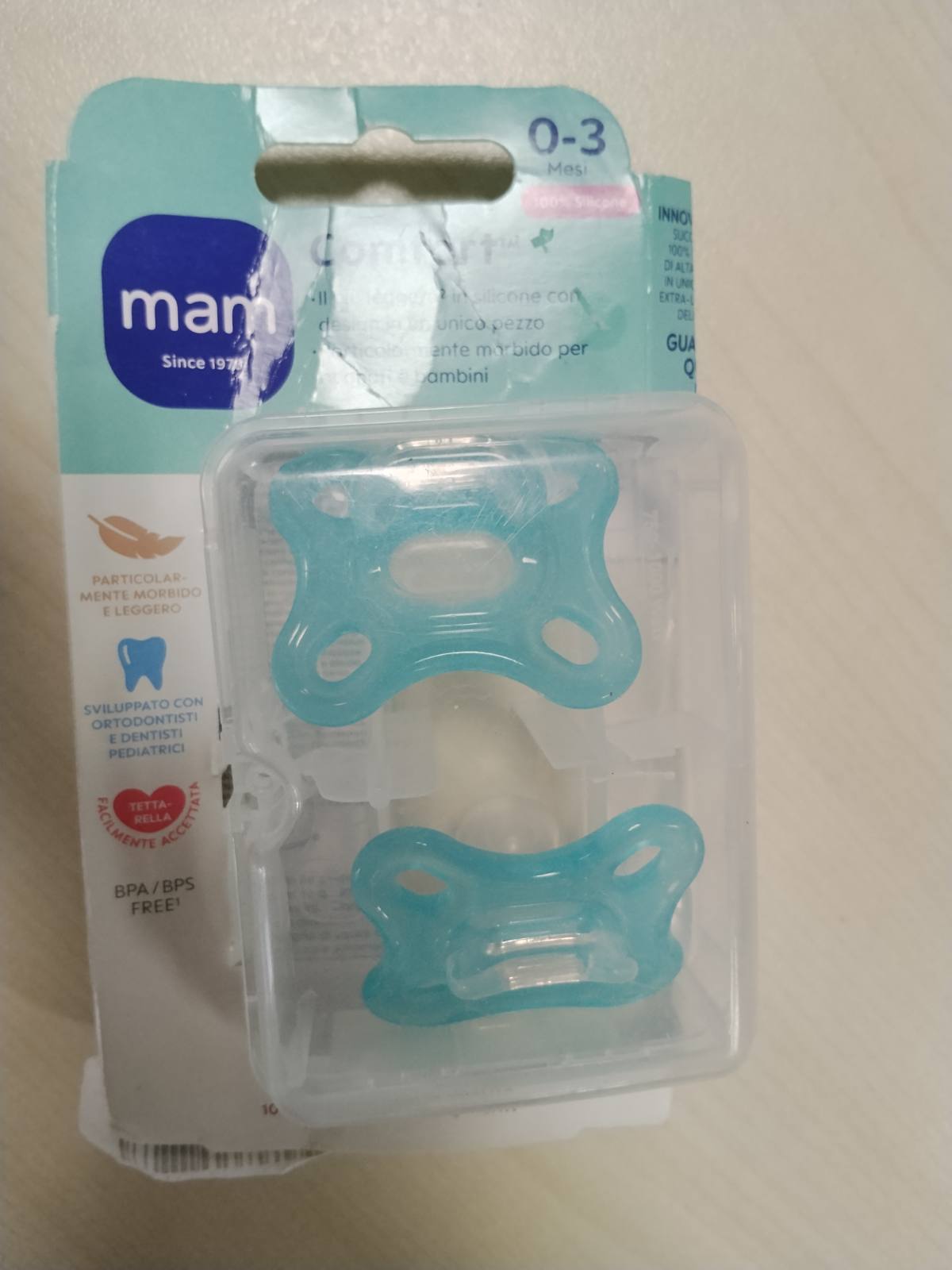 317657 - MAM Biberon Comfort 0-3 muajsh, Set prej 2 copësh, 100% silikoni, dizajn unik, me mbajtëse biberoni sterilizuese, Neutral