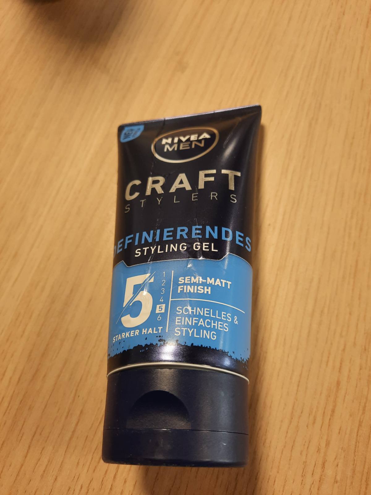 307003 - NIVEA MEN Xhel flokësh, 150 ml, përfundim gjysmë-mat, stilim i lehtë me fiksim të fortë, me Vitaminë E
