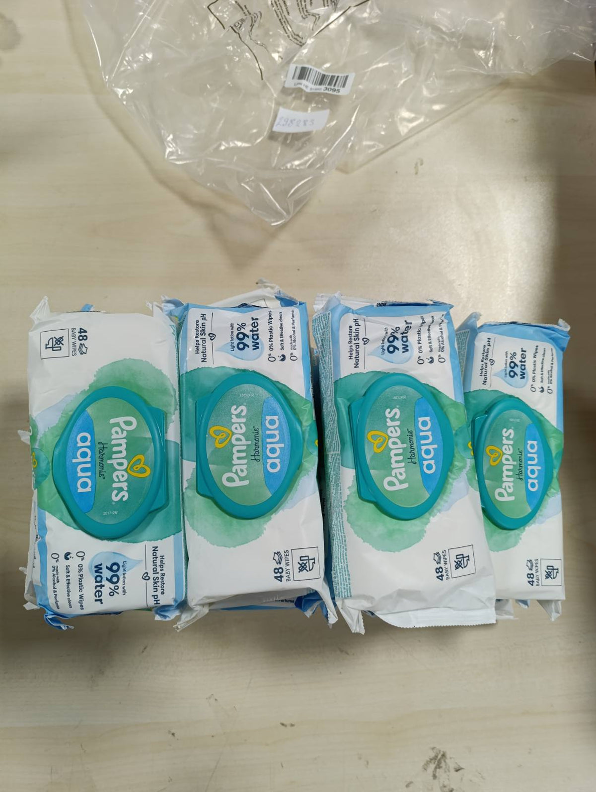 298283 - PAMPERS Pecetat Harmony Aqua, 15 pako me nga 48 peceta, gjithsej 720 peceta, locion me 99% ujë.