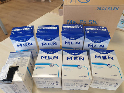 298011 - TENA MEN Protective Shield Extra Light, 112 peceta, 8 x 14 cm, të mbështjella individualisht, e zezë