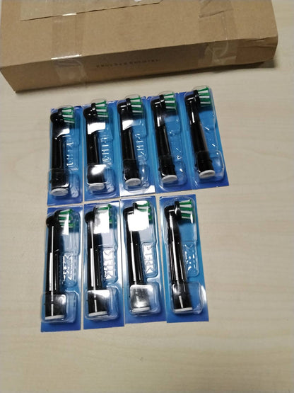 311229 - ORAL-B, Koka Zëvendësuse Pro Cross Action të zezë për Furçën elektrike të dhëmbëve, pako me 9 koka Zëvendësuse ORAL-B të zezë me tregues përdorimi