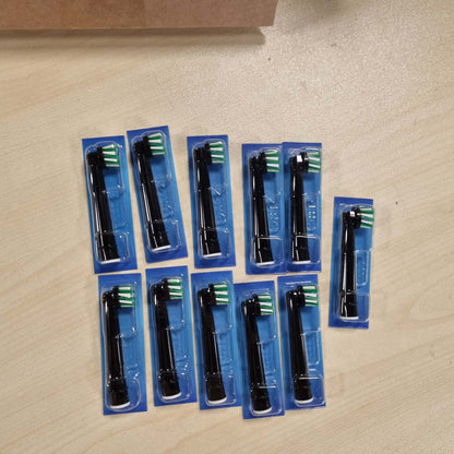 300586 - ORAL-B Koka Furçash Zëvendësuese PRO CrossAction, të Zeza, Pako me 12 Furça