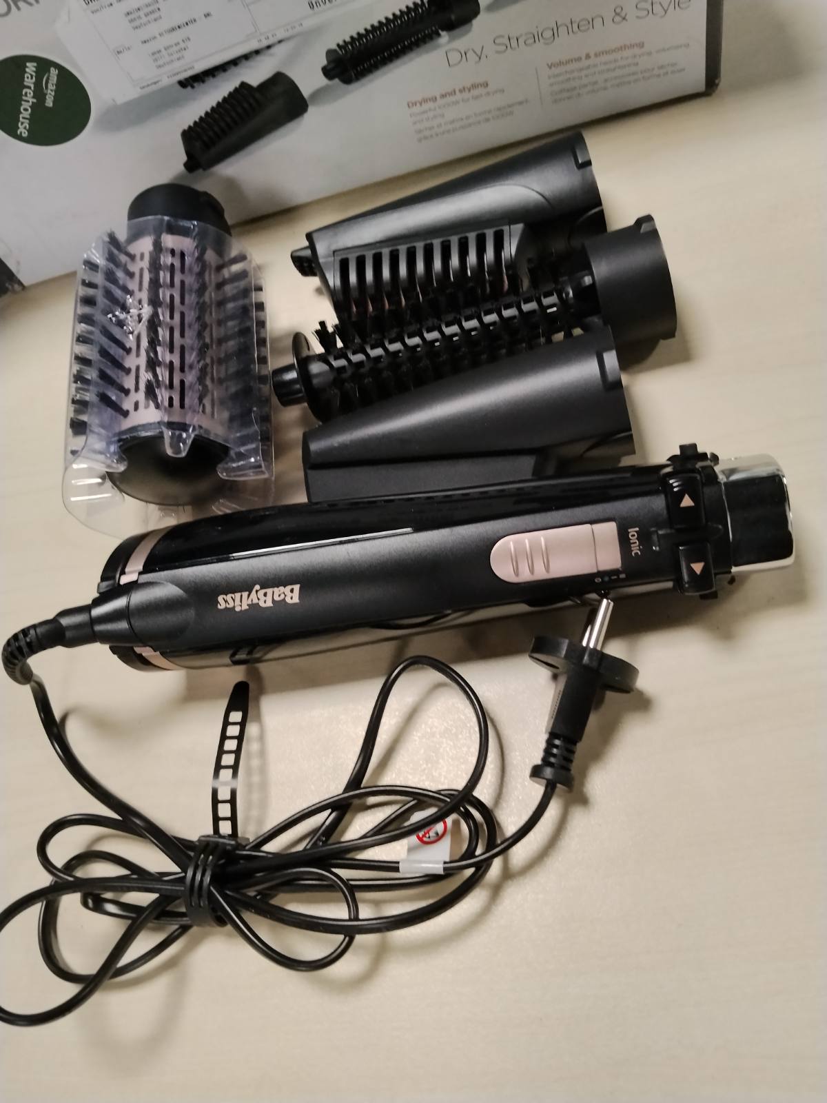 297938 - BABYLISS Furçë rrotulluese për tharëse flokësh AS200E, me 4 aksesorë të ndërrueshëm, funksion jonik, e zezë