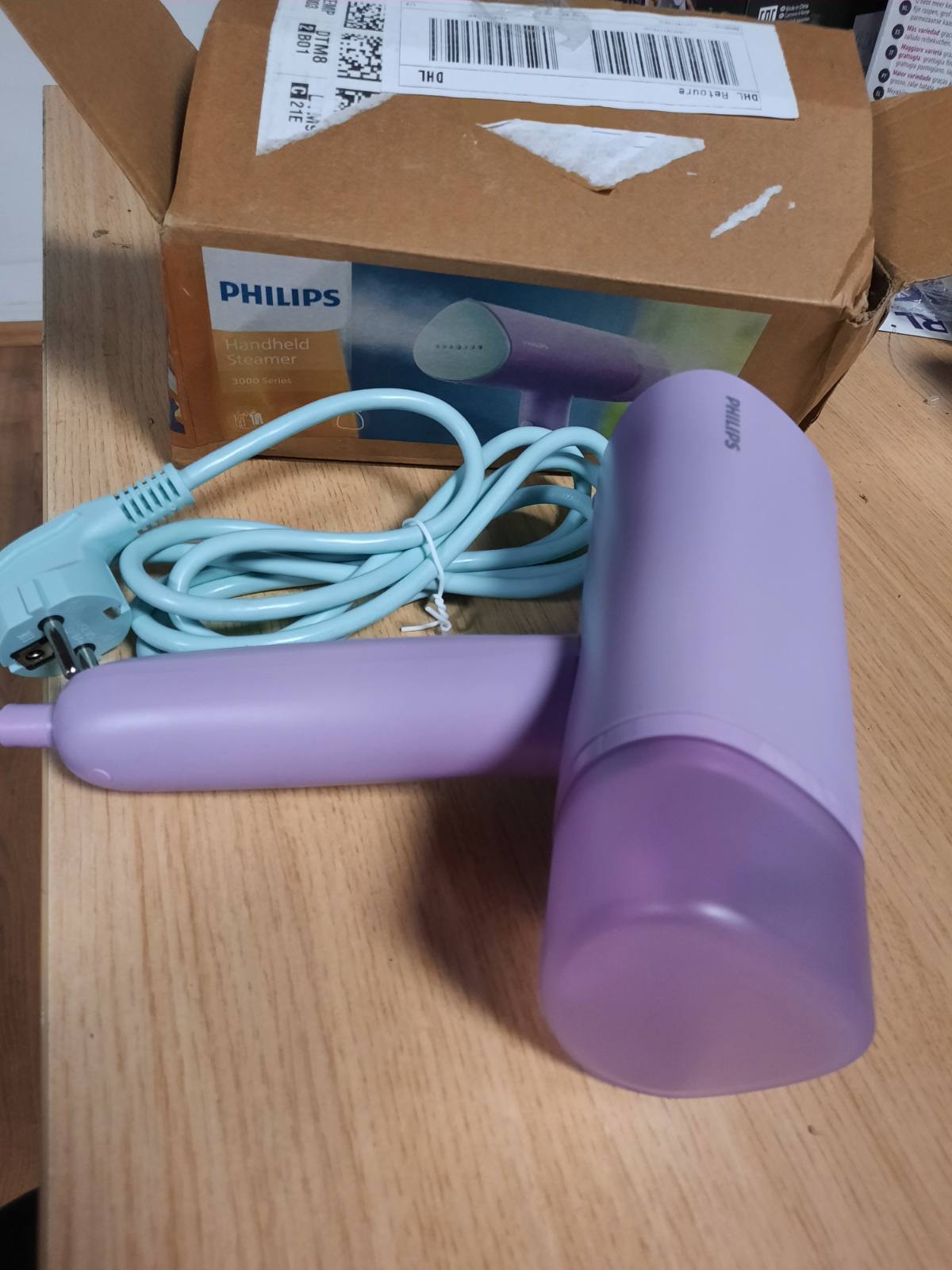 162550 - PHILIPS Avullues Portativ për Rroba, Seria 3000 - 1000W, Prodhojmë Avulli 20g/min, Kapaciteti i Depozitës së Ujit 100ml, Pastërues Pa Dërrasë Hekurosjeje, Peshë 630g, Ngjyra Vjollcë, Përfshin Qese Ruajtjeje, Modeli STH3010/30