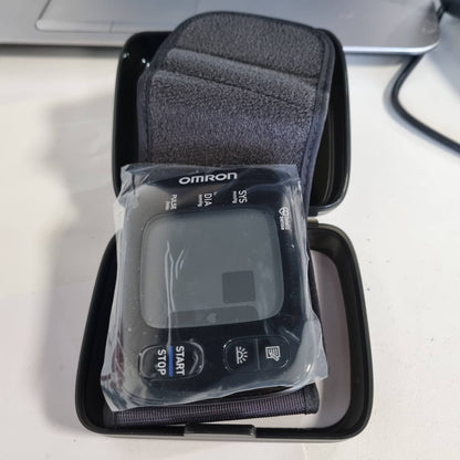296598 - OMRON Monitor dixhital i tensionit të gjakut RS7 Intelli IT, në kyçin e dorës, i pajtueshëm me Bluetooth, i validuar klinikisht
