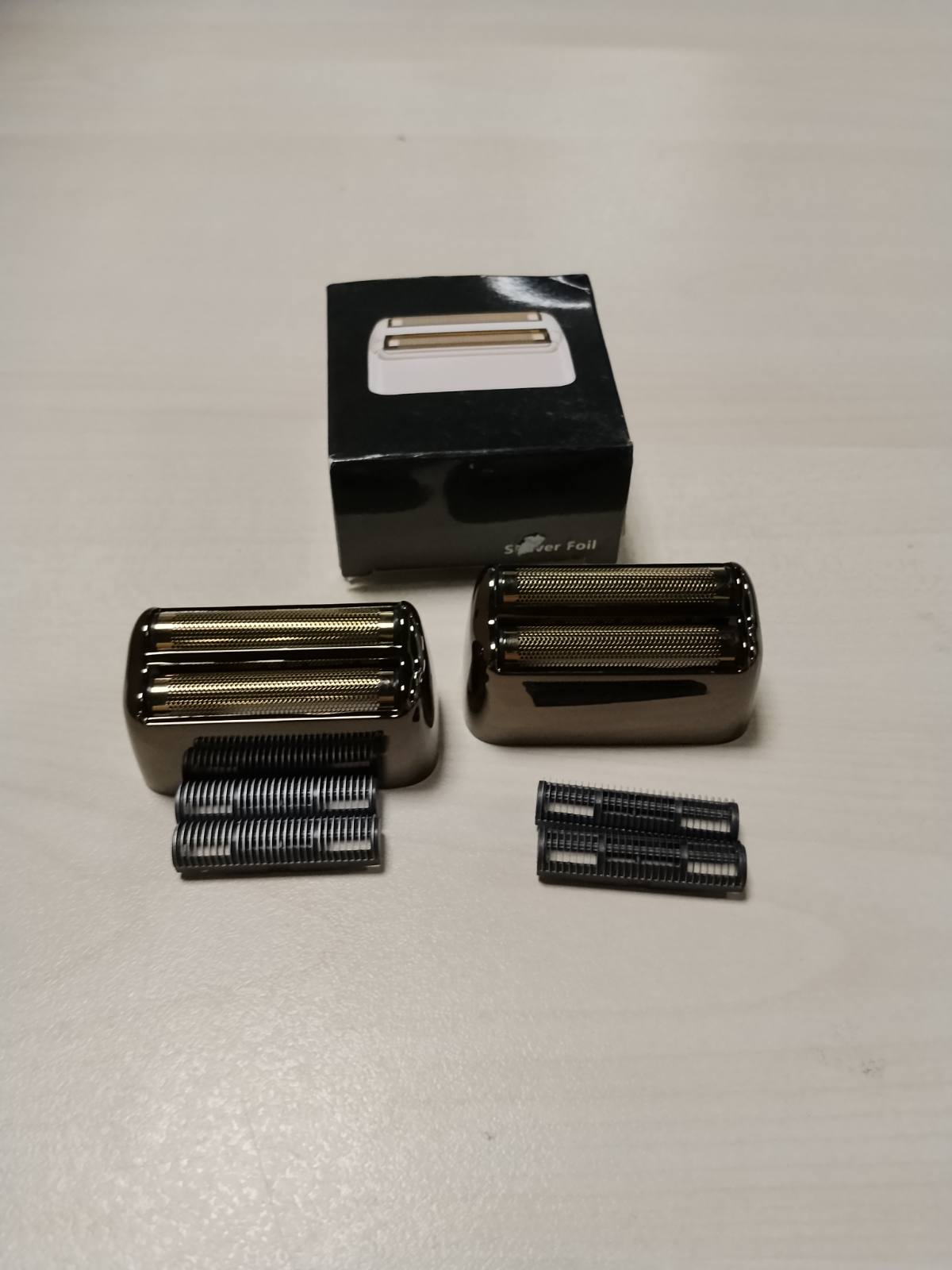 301941 - BABYLISSPRO Fletë metalike dhe prerëse zëvendësuese për makinën e rrojës FXFS2 (FOILFX02), e zezë/2 copë