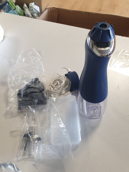 315281 - Pastrues uji pa tel Advanced, 3 cilësime presioni, Pajisje për heqjen e pllakës, ideale për udhëtime dhe banjo të vogla, Karikues USB, Blu (WP-583EU)
