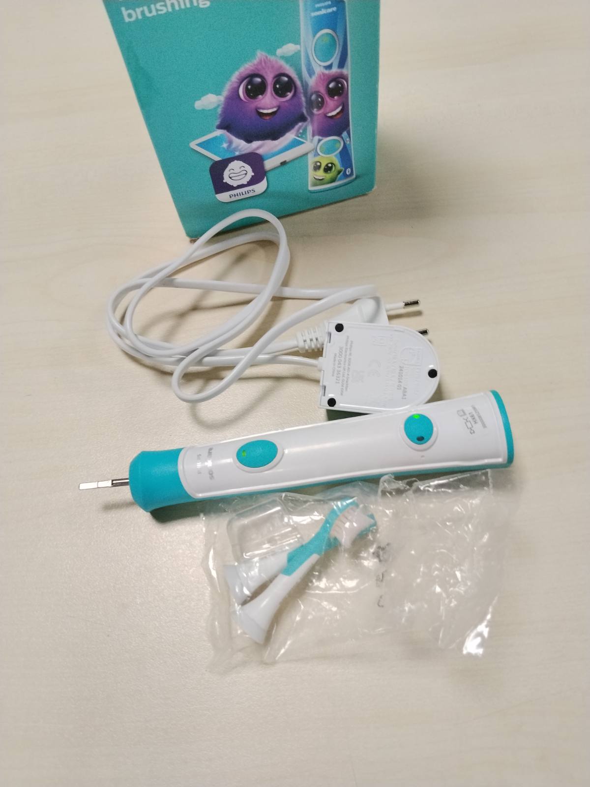 289710 - PHILIPS Sonicare For Kids, furçë dhëmbësh elektrike sonike HX6322/04, për fëmijë 3 vjeç e lart, ngjyrë turkeze, me SmartTimer dhe QuadPacer