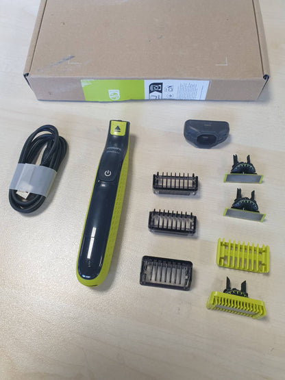 302836 - PHILIPS OneBlade 360 Fytyrë & Trup - Makinë rroje elektrike, prerëse flokësh dhe pastrues trupi, 3 tehe 360, 3 aksesorë shkurtimi (1/3/5 mm), 2 aksesorë trupi, Rruajtje e lagësht dhe e thatë për fytyrën dhe trupin (QP2824/31)