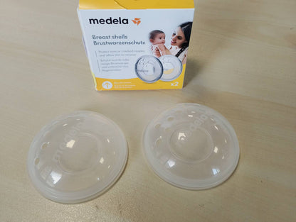 307696 - MEDELA Mbrojtëse thithkash – Pa BPA, silikoni i butë – Me hapje ventilimi – pako me 2 copë