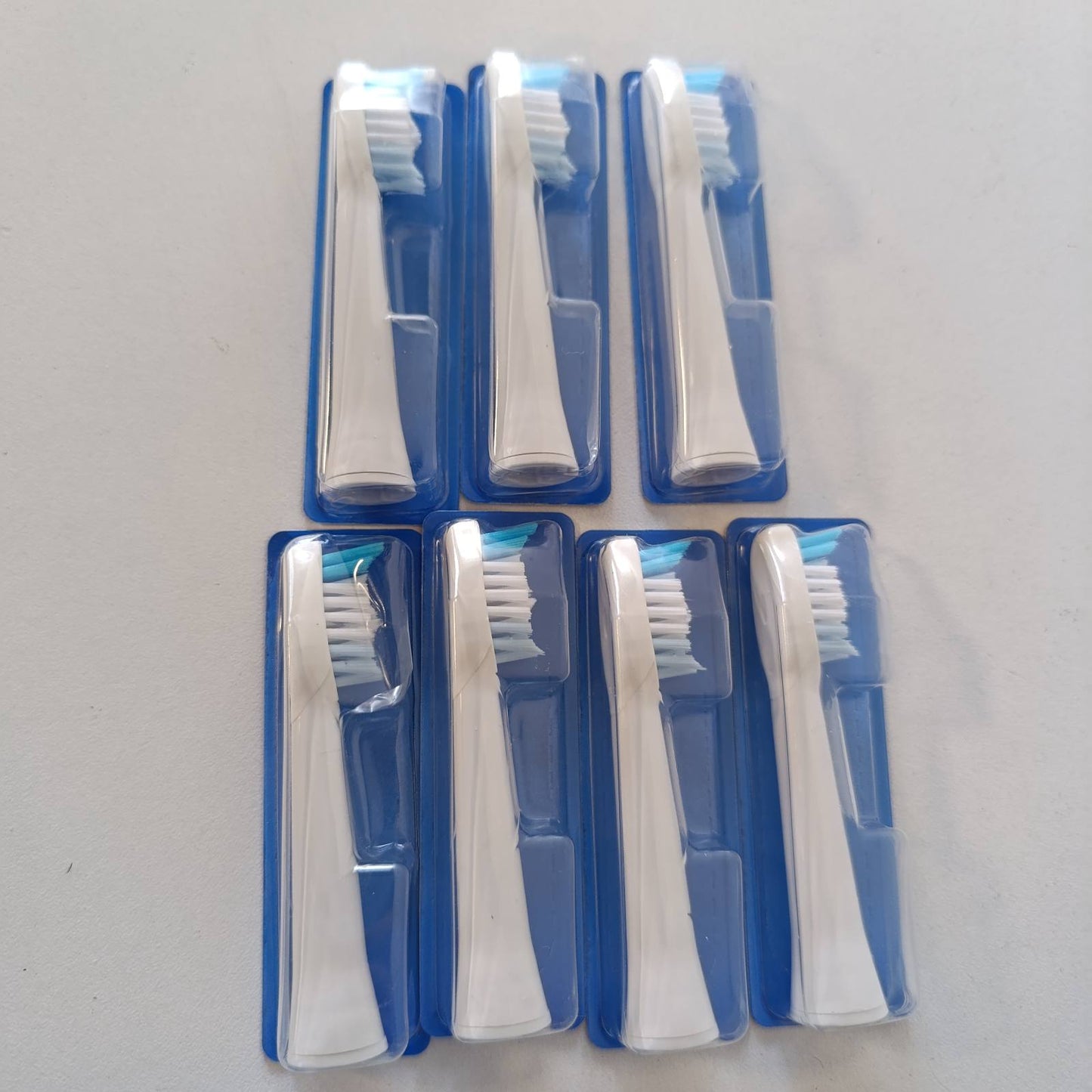 289839 - ORAL-B - Koka Furçash Zëvendësuese Pulsonic Clean, të Bardha, Pako me 7 Furça