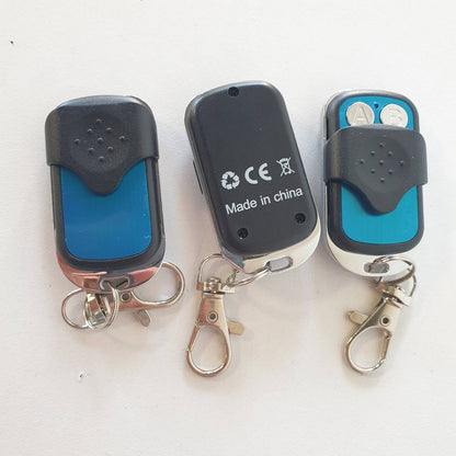 310552 - Set me 3 telekomanda universale, kod i fiksuar, frekuencë 433.92 MHz, për porta automatike