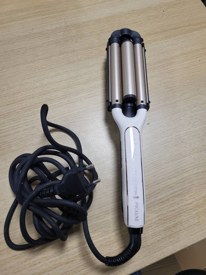 289669 - REMINGTON Hekur me Valë ProLuxe CI91AW, 4-në-1: Plazh, Valë Natyrale, Valë Uji, ekran dixhital, cilësim temperature deri në 210°C, ngjyrë rozë e bardhë