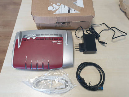 295713 - AVM FRITZ!Box 6490 WLAN Router AC + N me kabllo - Modem kabllor DOCSIS 3.0 për lidhje kabllore, telefoni VoIP deri në 5 GHz, bazë DECT (I rinovuar)