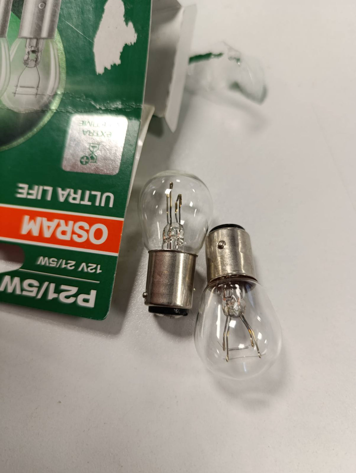 335646 - OSRAM ULTRA LIFE, P21/5W, Flluskë e dyfishtë, (2 llamba)