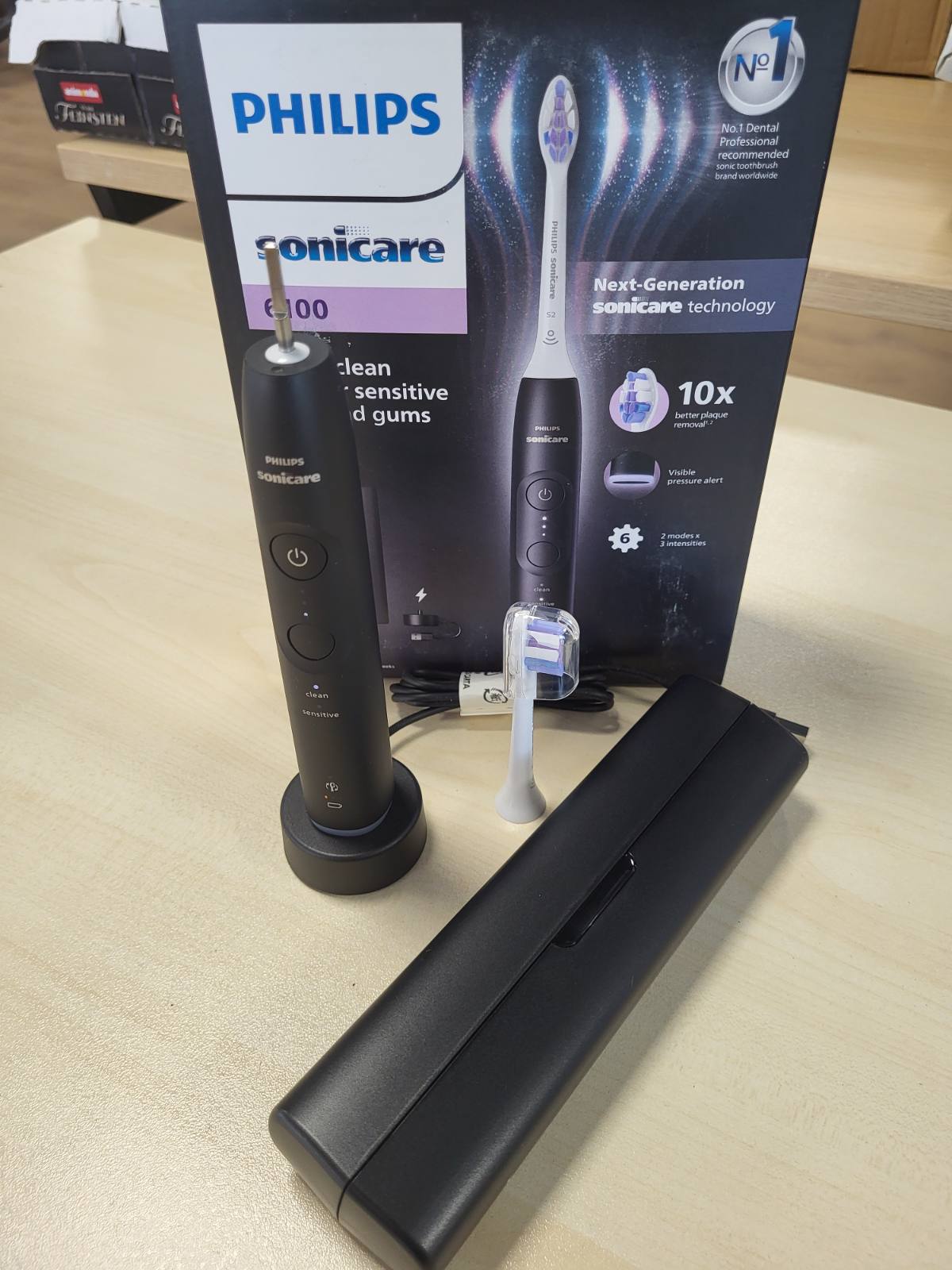 292156 - PHILIPS Furçë dhëmbësh elektrike Sonicare 6100, furçë dhëmbësh sonike me 2 mënyra pastrimi dhe 3 nivele intensiteti, kontroll presioni, EasyStart, SmartTimer, e zezë, modeli HX7401/07